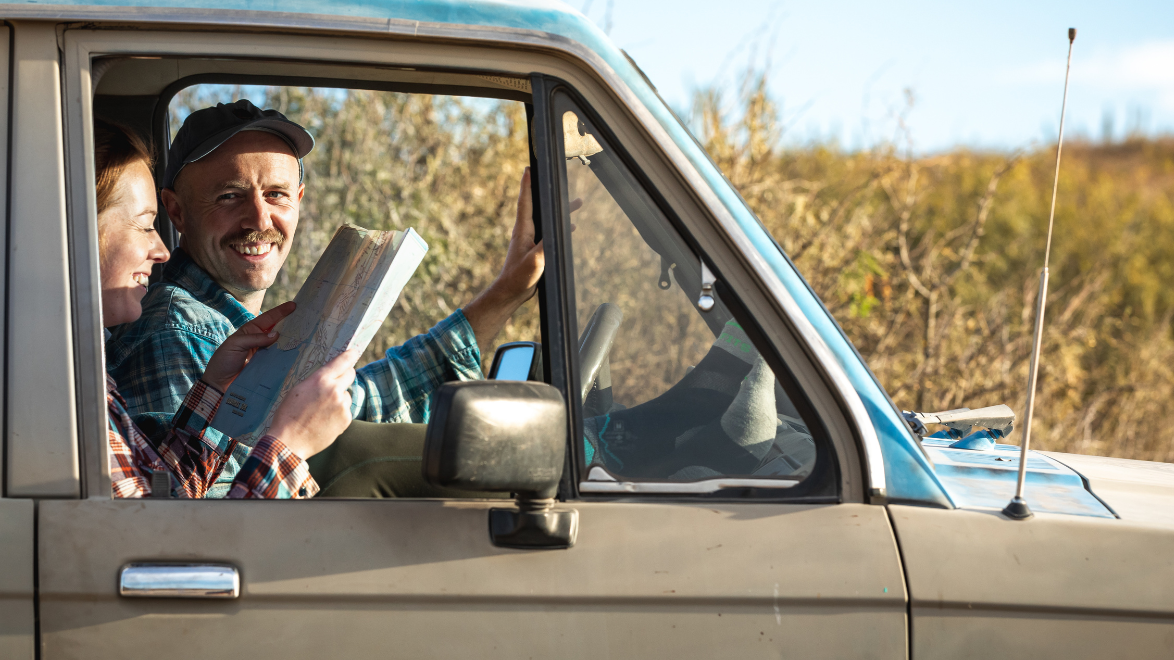 a couple ready to go skiing with their warm gear