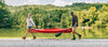 People moving a kayak