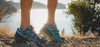 Person standing on dirt with hiking sneakers