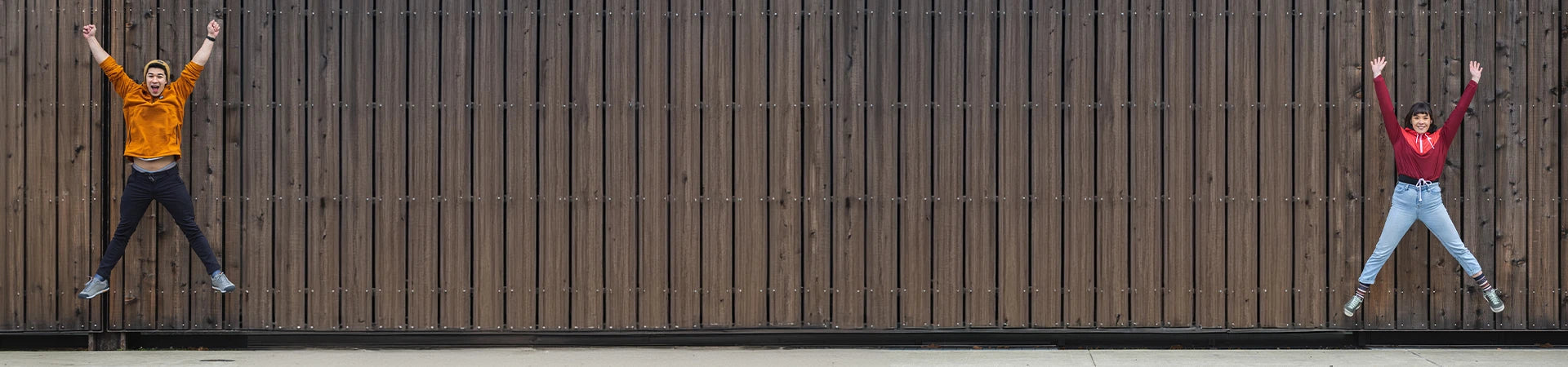 woman walking on rocks over a river